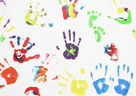 Painted children's hands on a white background